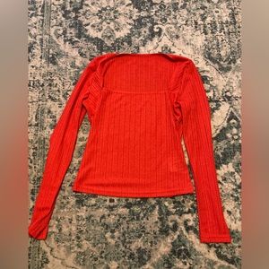 Orange long sleeve top